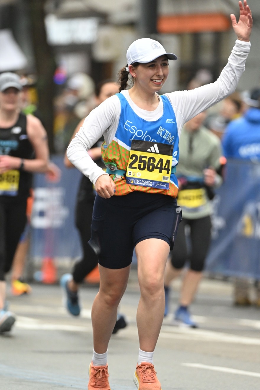 Runner crossing the Falmouth finish line